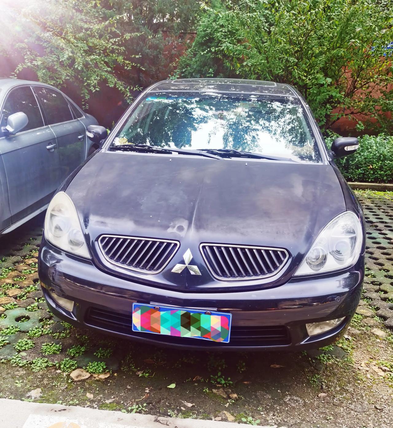 三菱格兰,2.0/2.4的排量 街上都见不到