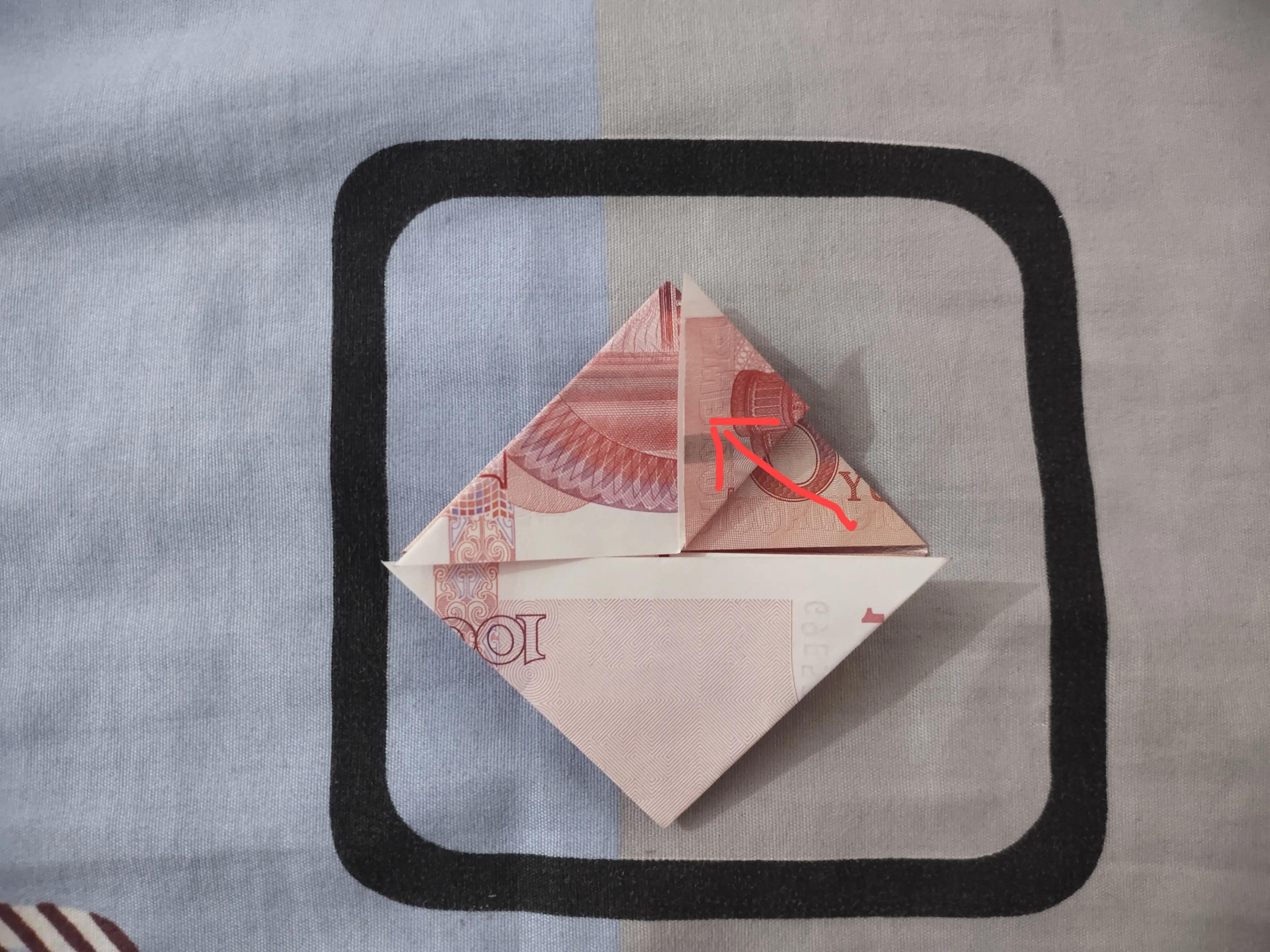 爱心折纸教程图解步骤,100元钞票爱心折纸教程