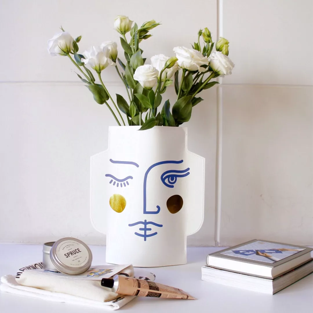 brass and clear glass test tube vases