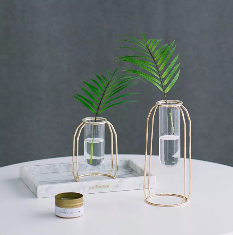 brass and clear glass test tube vases