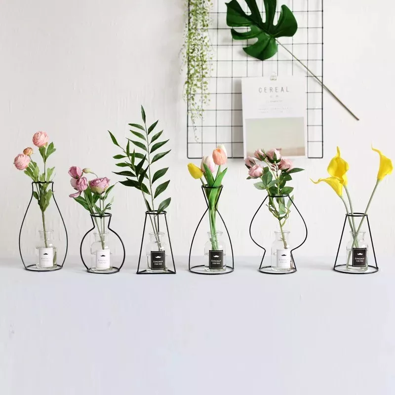 brass and clear glass test tube vases