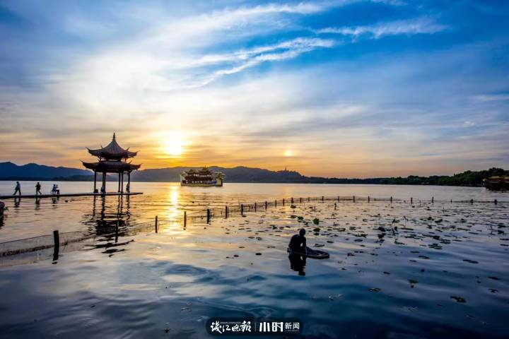 好摄|西湖边拍日落最有名的集贤亭,怎么被“包裹”起来了?