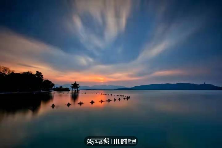 好摄|西湖边拍日落最有名的集贤亭,怎么被“包裹”起来了?