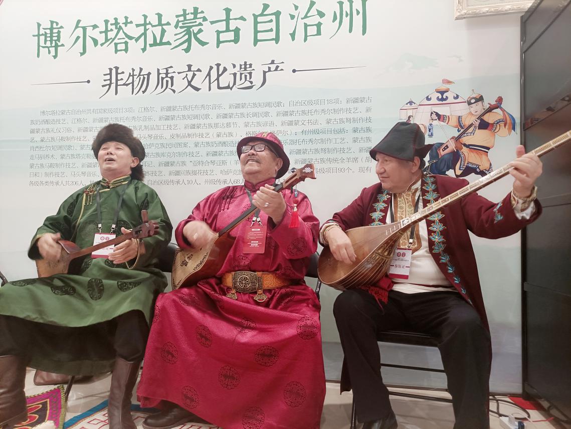 非遗竞放异彩 记忆薪火相传——新疆是个好地方-对口援疆19 省市非物质文化遗产展侧记