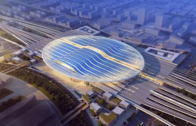 河北省雄安新区的雄安火车站效果图如下所示.