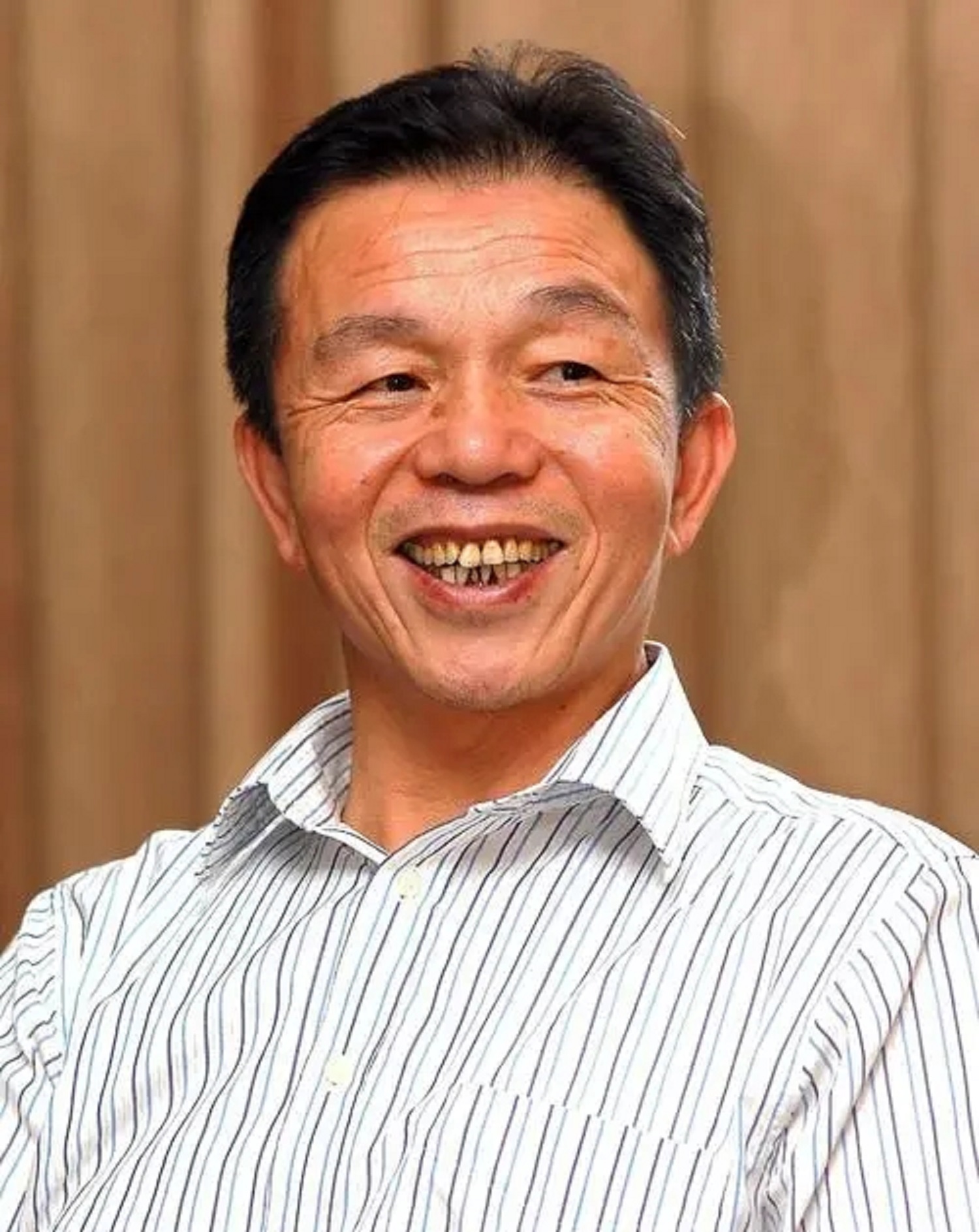 从白手起家到“福建首富”，被人尊称为“商业教父”，齐名曹德旺