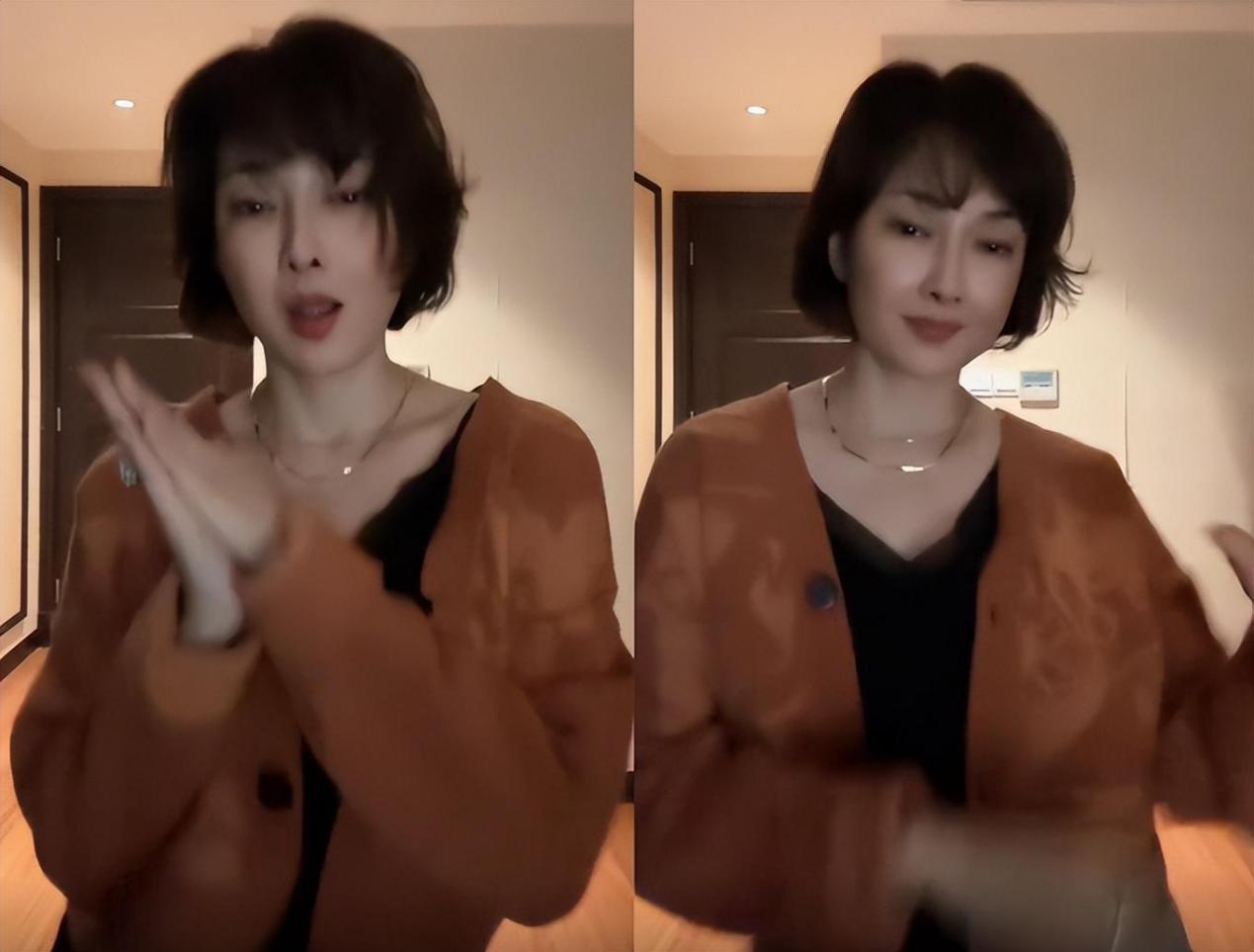 49岁女人图片49岁牛莉在家中热舞嘟嘴卖萌似少女穿深v长裙配短发太