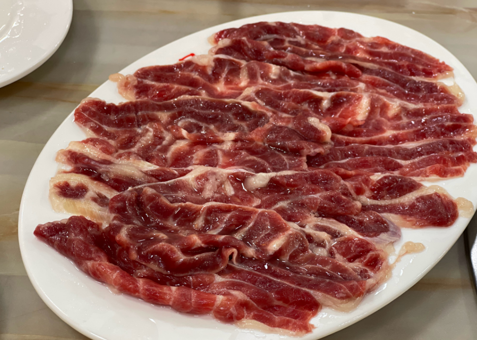 一般牛肉火锅搭配啥才好吃(牛肉火锅和什么搭配才好吃)