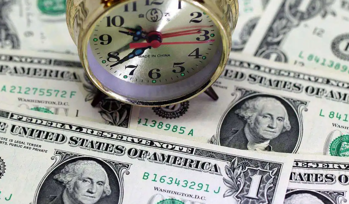 12�����״Σ��й�����������ծ���ѵ���1������Ԫ���ձ�Ҳ���ж�