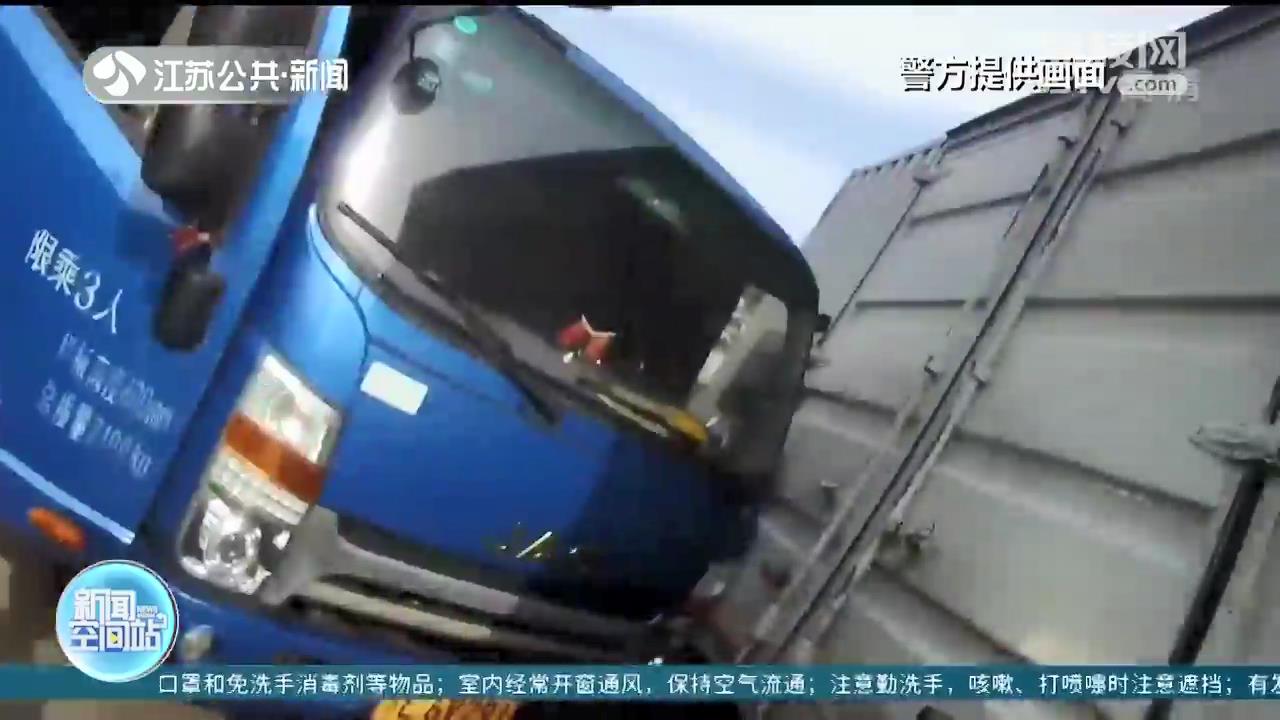 惊险！苏州一货车司机忘拉手刹 溜坡后还想“螳臂当车”