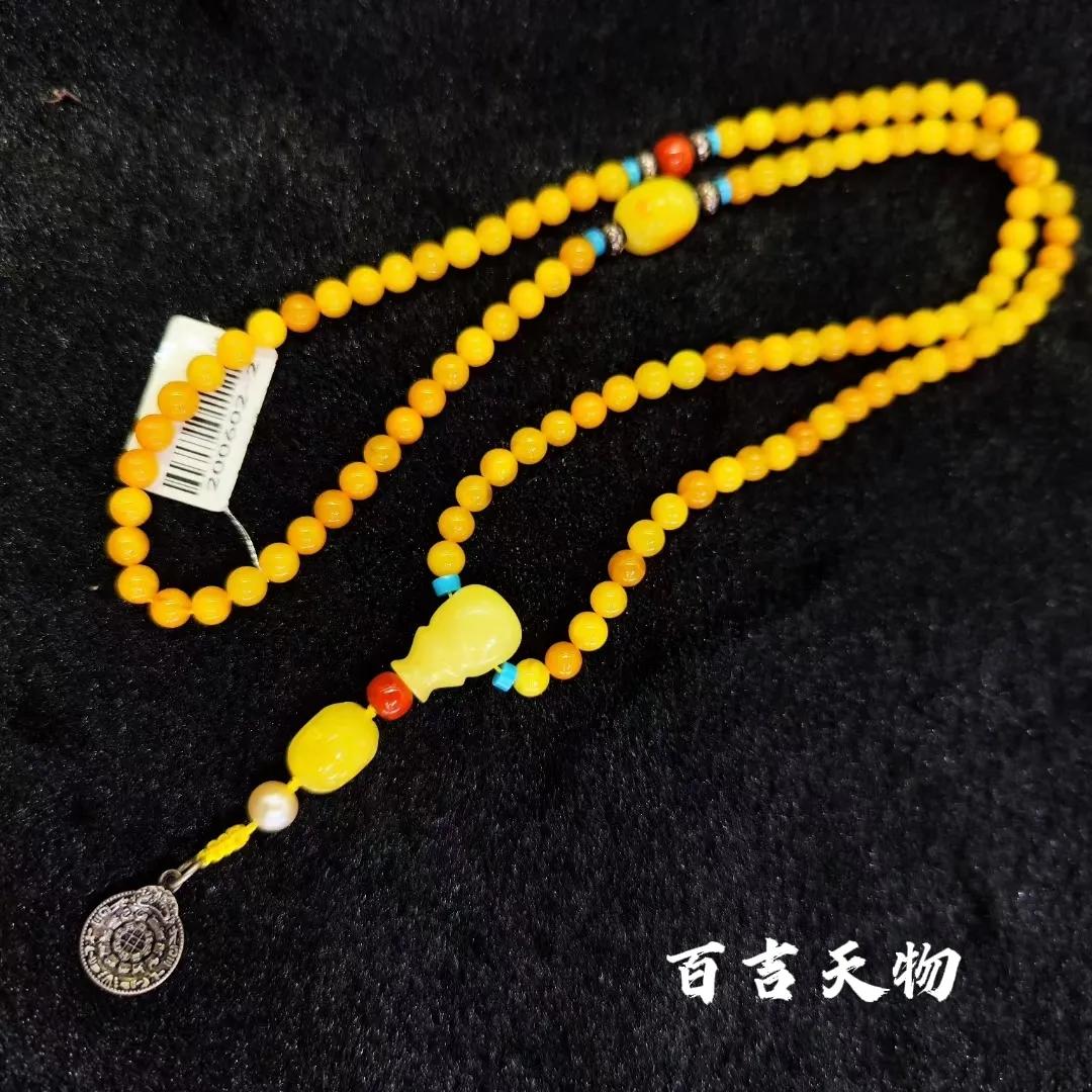 蜜蠟佛珠和換上靚麗春裝的你