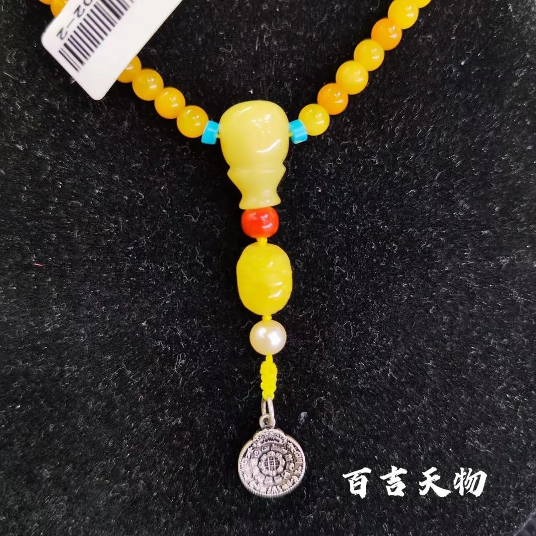 蜜蠟佛珠和換上靚麗春裝的你