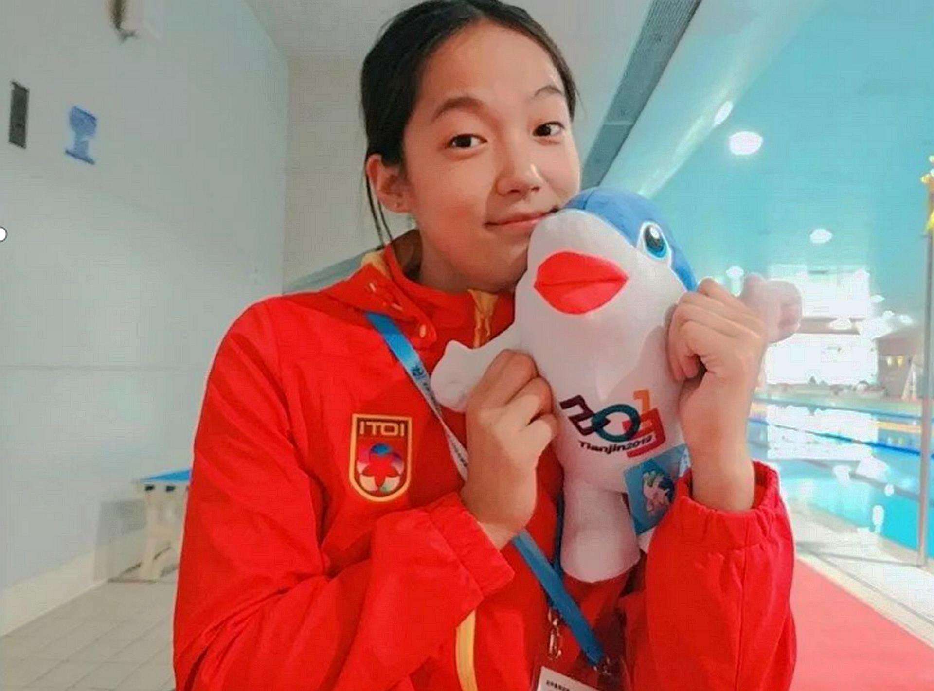 22年前一张照片感动无数人，如今主人公已长大，成为奥运健儿