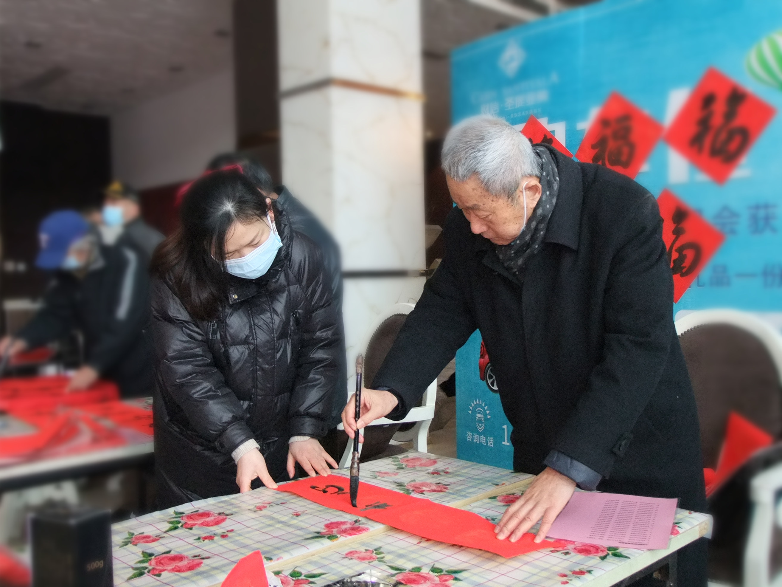 迎冬奥，贺新春书法家义写春联活动在郑州举行