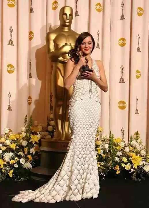 玛丽昂·歌迪亚 全球最美女性的玫瑰人生