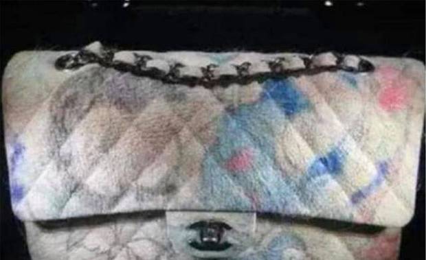 他给活猪纹身，一张猪皮卖70多万，香奈儿高价买走制成限量版包包