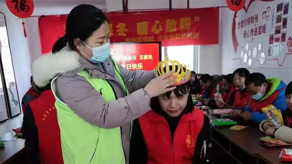 用爱助残，让阳光照进残疾人的心田