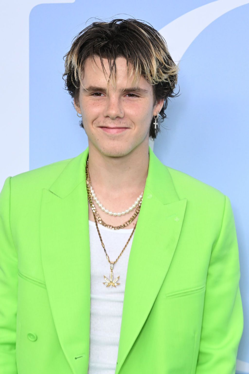 贝克汉姆带小儿子参加时装秀展 父子俩打扮时尚潮流帅气逼人