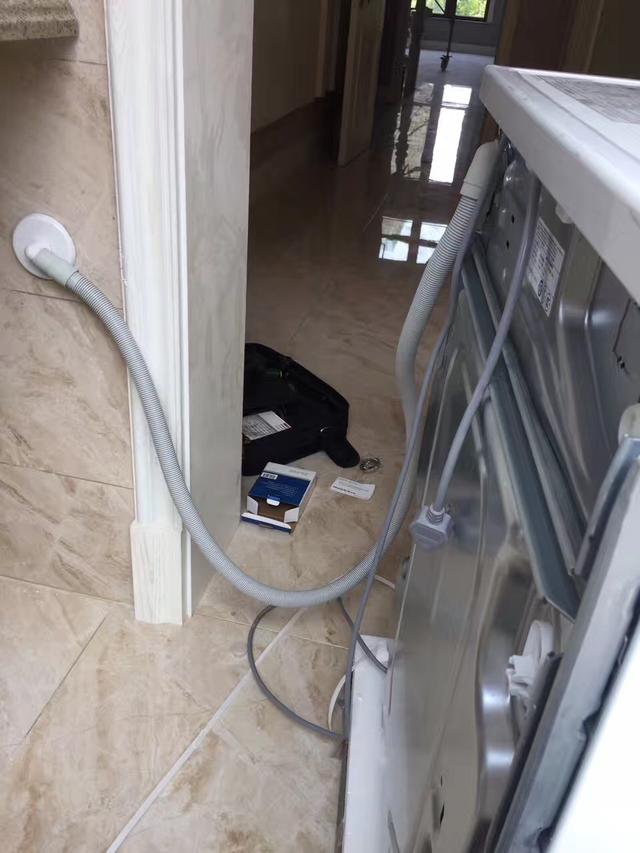 上排水洗衣机(上排水洗衣机排水管安装示意图)